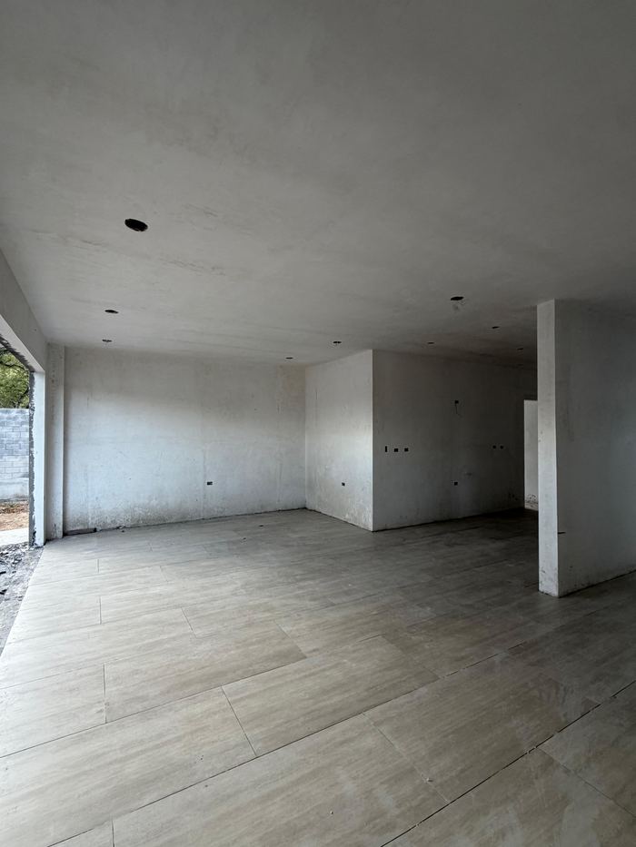 Área social de planta baja en obra